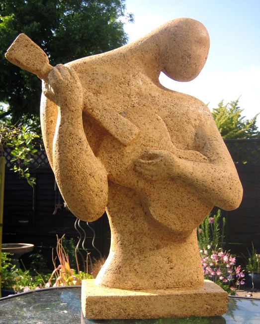 Sculpture of a left-handed guitar player