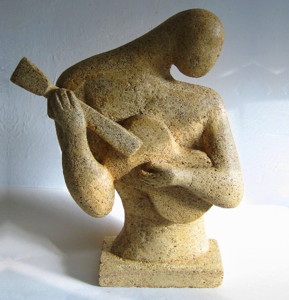 Sculpture of a left-handed guitar player